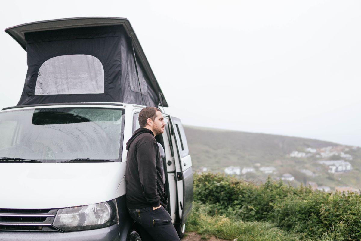 Man standing outside of his motorhome.