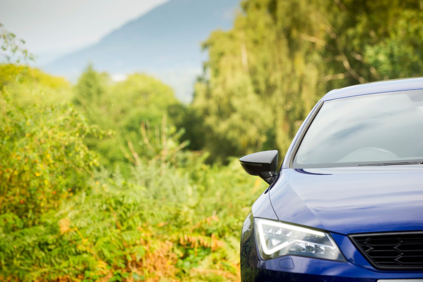 Blue car parked in the Lake District